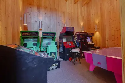 a room with a bunch of video game machines at Carnelian Woods # 11 By Hauserman Rentals in Carnelian Bay