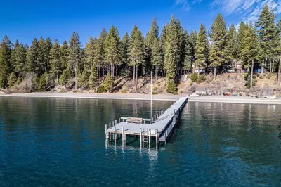 a dock in the middle of a body of water at NorthShore # 47 By Hauserman Rentals in Tahoe City