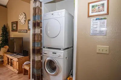 a washer and dryer in a living room at Dollar Hill II # 49 By Hauserman Rentals in Tahoe City