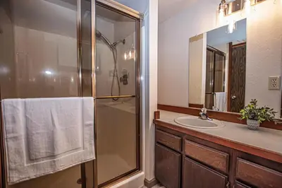 a bathroom with a shower and a sink at Casa Pasquale By Hauserman Rentals in Carnelian Bay