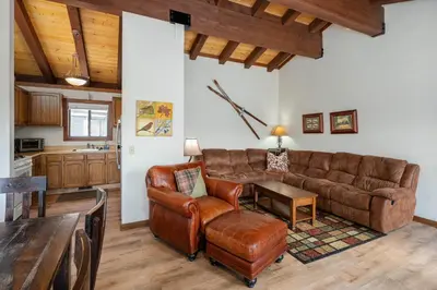 a living room with a couch and a table at St Francis #14 By Hauserman Rentals in Tahoe City