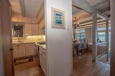 a kitchen and dining room with a table and a dining room at Star Harbor # 8 By Hauserman Rentals in Tahoe City