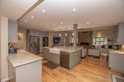 a large kitchen with a large island in the middle at Stephens Retreat By Hauserman Rentals in Carnelian Bay