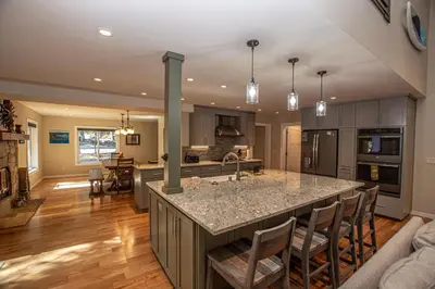 a kitchen with a large island in the middle at Stephens Retreat By Hauserman Rentals in Carnelian Bay