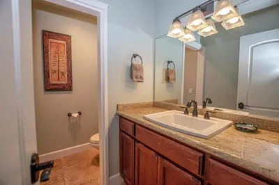 a bathroom with a sink and a mirror at Weathertop By Hauserman Rentals in Tahoe City