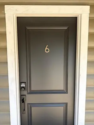a door to a house with ajar at Columbia Cabins Cabin 6 in Sonora