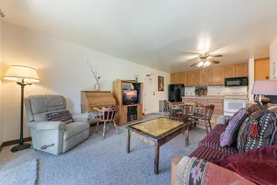 a living room with a couch and a table at Spacious 1BR Condo #218 at Donner Lake Village in Truckee