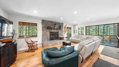 a living room with a couch and a fireplace at Secluded Incline Village Stay w Deck Near Diamond Peak Lake Cloud 9 and 12 by AvantStay in Incline Village
