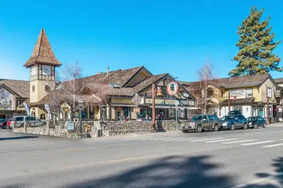 a town with cars parked in front of a building at Blue Lake Bliss in Tahoe City