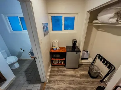 a small room with a bathroom with a refrigerator at The Chalet at Kings Beach Unit 4 in Kings Beach