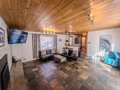 a living room with a couch and a tv at The Chalet at Kings Beach Unit 8 in Kings Beach