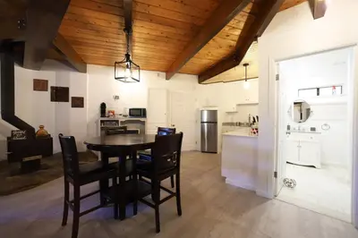 a kitchen and dining room with a table and chairs at Spacious 3BR Retreat - Sleeps 10 - Free Parking in Camino