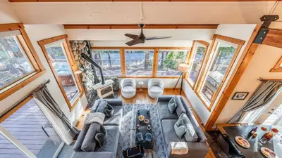 an overhead view of a living room in a tiny house at Year-Round Tahoe Escape with Hot Tub Outdoor Dining Timberline Haven by AvantStay in Tahoe Vista
