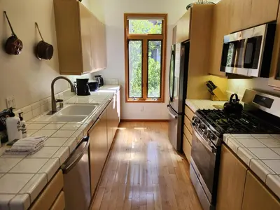 a kitchen with a sink and a stove at Snowcreek Resort Vacation Rental 934 in Mammoth Lakes