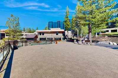 a large parking lot in front of a building at Everline Resort & Spa 630 in Olympic Valley