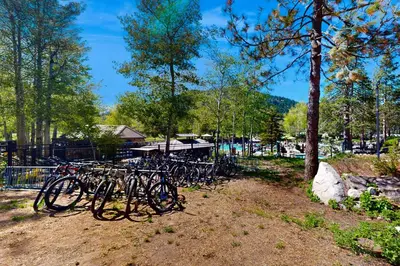 a group of bikes parked next to a fence at Everline Resort & Spa 630 in Olympic Valley