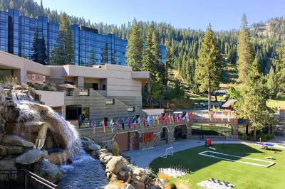 a resort with a waterfall and a water park at Everline Resort & Spa 630 in Olympic Valley