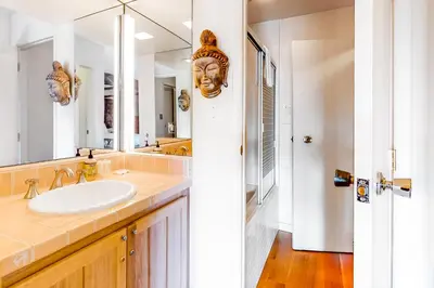 a bathroom with a sink and a mirror at Tahoe Safari in Incline Village