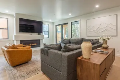 a living room with a couch and a fireplace at The Reserve #126 in Mammoth Lakes