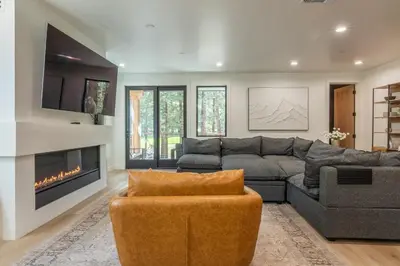 a living room with a couch and a fireplace at The Reserve #126 in Mammoth Lakes