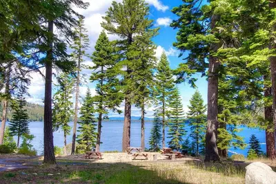 a picnic area with a view of a lake at COH1444 - Fallen Leaf Relief home in South Lake Tahoe
