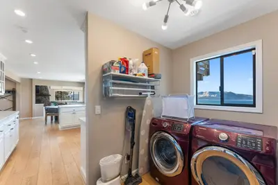 a kitchen with a washing machine in a room at HCH0868 - The Grand Escape home in South Lake Tahoe