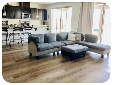 a living room with a couch and a table at \u8212\u670d\u5bbd\u655e\u7684\u7a7a\u95f4