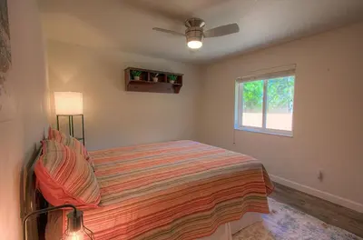 a bedroom with a bed and a window at NVH0823 - Sadies Hustle home in Zephyr Cove