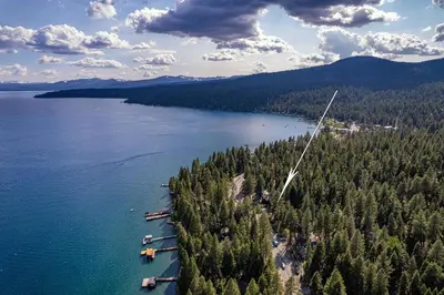 an aerial view of a lake with trees and boats at Retreat with Private Hot Tub steps North Lake Tahoe in Carnelian Bay
