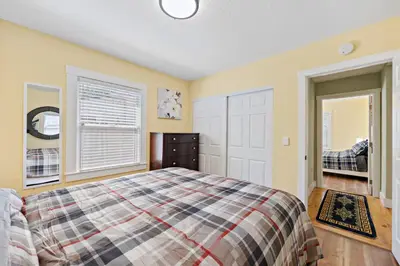 a bedroom with a bed and a window at Cozy Home 7 minutes Walk to UC Davis Sacramento in Sacramento
