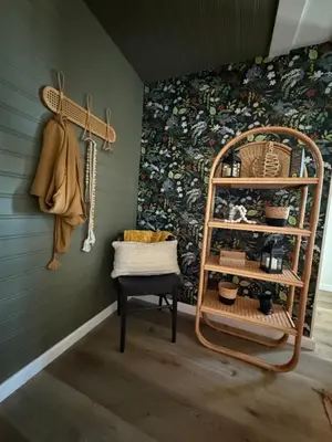 a room with a shelf and a wall with a painting at Scenic Ranch Retreat Near Fresno in Fresno
