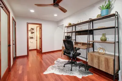 an office with a desk and a chair in a room at Elegant Granite Bay Getaway Tall Pine Home in Granite Bay