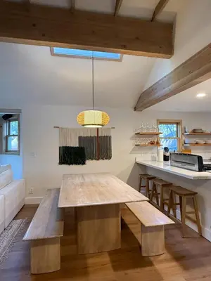a dining room with a bench and a table at Walk to Lake 4BR Memory Making Alpine Retreat in Tahoe City