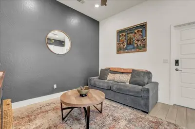 a living room with a couch and a table at Peaceful Guest Casita with Private Entrance and No Cleaning Fee in Hanford