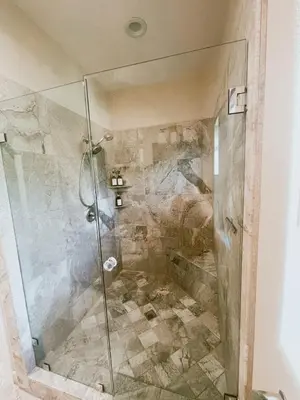 a shower with a glass door in a bathroom at Beautiful Lake Views with Hot Tub and Space for Family in Oakhurst