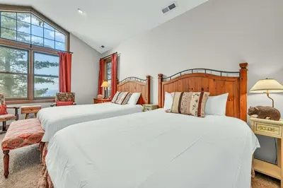 a bedroom with two beds and a window at South Tahoe Haven Views Comfort Fun in South Lake Tahoe