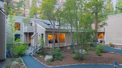 an exterior view of a house with a yard at Near Ski Beach Hiking Trails Clubhouse Pool Hot Tub Access Juanita Blue by AvantStay in Incline Village