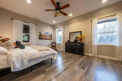 a bedroom with a bed and a ceiling fan at Historic Mountain Retreat - Near Boreal - 3 Kings in Emigrant Gap