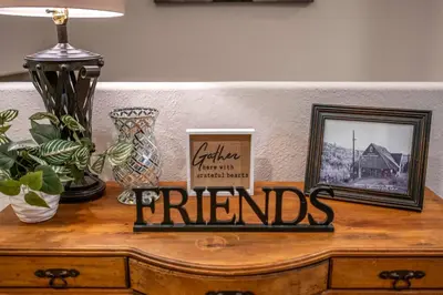 a wooden dresser with a picture on top of it at Historic Mountain Retreat - Near Boreal - 3 Kings in Emigrant Gap