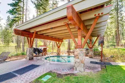 a pavilion over a swimming pool with a deck at Northstar Ski-InandOut Condo with Resort Amenities! in Truckee