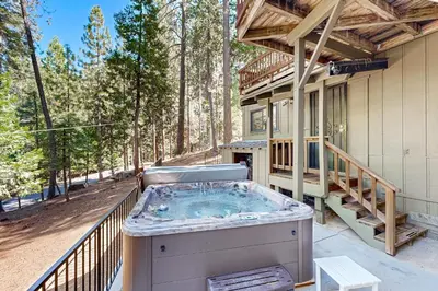 a hot tub on a balcony of a house at Hot Tub, Game Room and Home Gym Serene Arnold Gem in Arnold