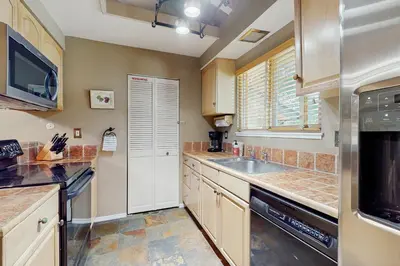 a kitchen with a sink and a dishwasher at Sierra Snow Haven in Incline Village