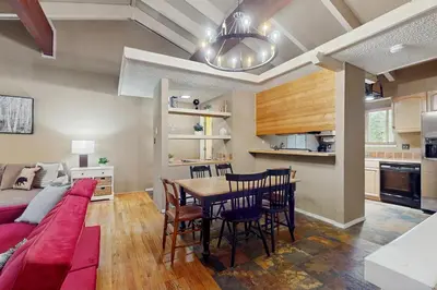 a kitchen and dining room with a table and chairs at Sierra Snow Haven in Incline Village