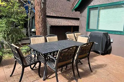 a black table and chairs on a patio at Camp Tahoe in Incline Village