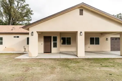 a house with a garage at The Oakhurst Oasis - Family & Fun Edition in Oakhurst