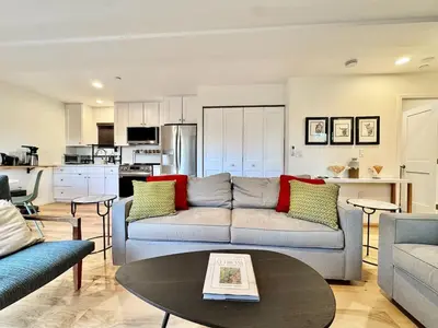a living room with a couch and a table at Unique Container, Home 20 Acres, Modern Stay in Placerville