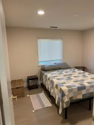 a bedroom with a bed and a window at 2 bed 1 bath special woodlake duplex A in Sacramento