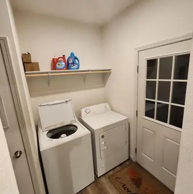 a washer and dryer in a small room at Home away from Home - 6 miles from the SNP in Three Rivers