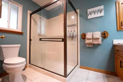 a bathroom with a shower and a toilet at Magic Sequoia Spacious Home in Three Rivers