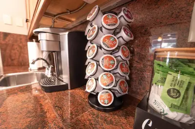 a kitchen counter with a wall of canned food at Riverside Retreat in Three Rivers - Natures Paradise in Three Rivers